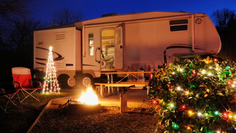 An RV decorated for Christmas with slide outs the have moved on their own