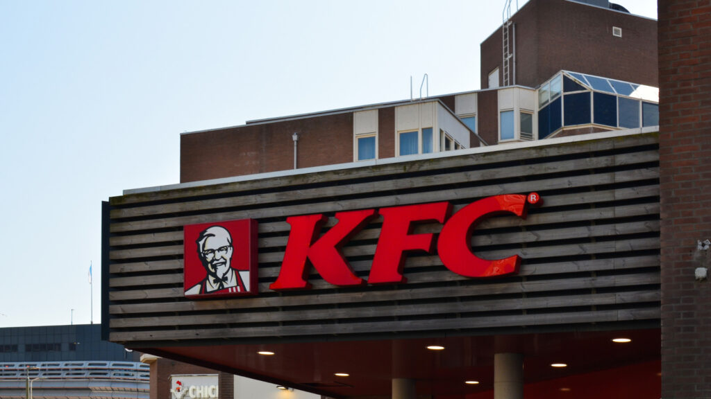 A KFC sign, a fast food chain a woman failed to drive her RV through the drive-thru