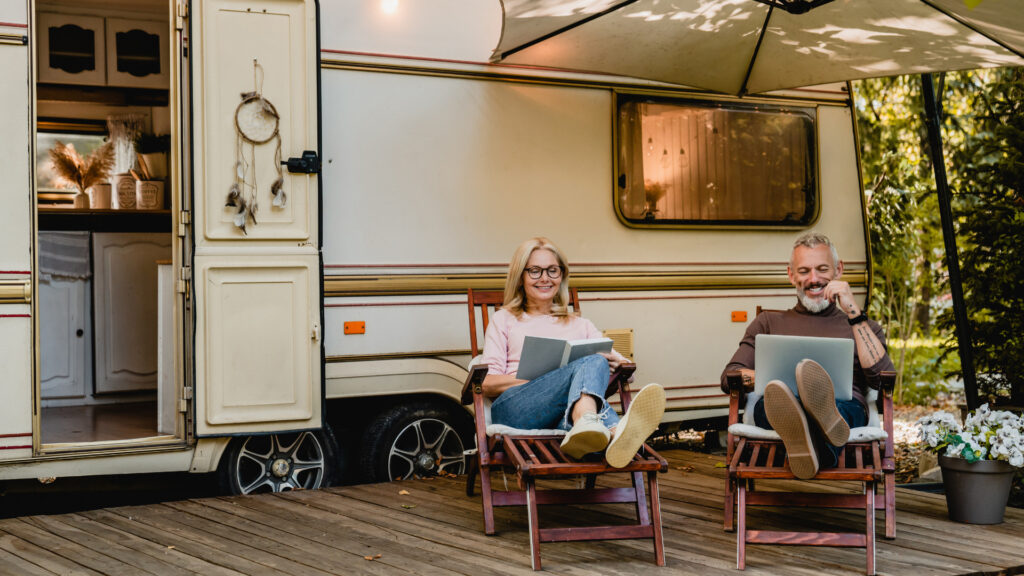 A couple living the retirement dream by their RV