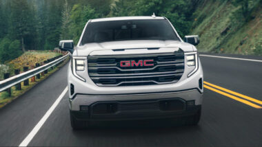 A gmc sierra 1500 on the road with an impressive towing capacity