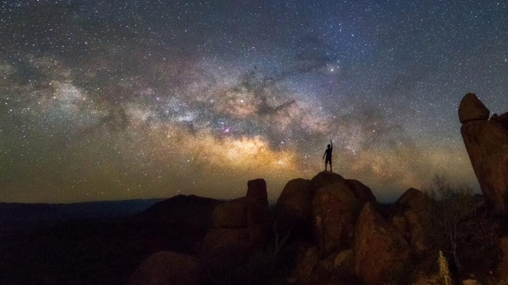 A person at Big Bend national park near terlingua texas at night