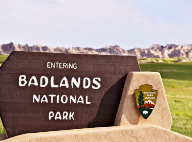 A sign for badlands national park as you enter the park