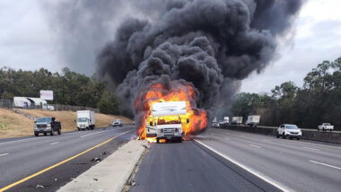 An RV on fire on the freeway