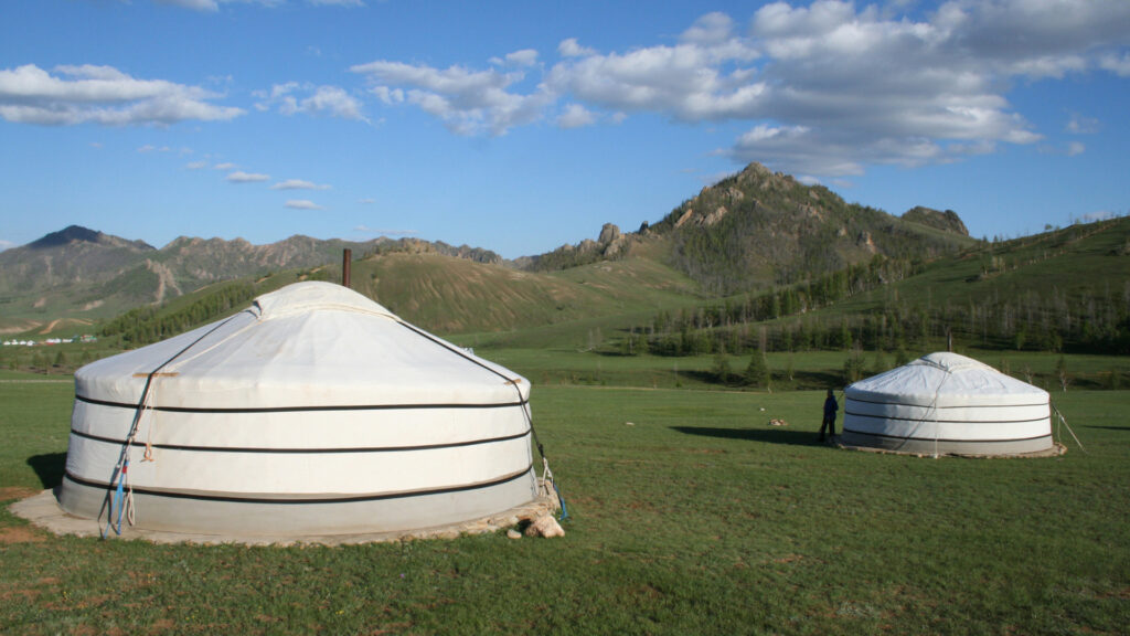 Two yurt tents outside