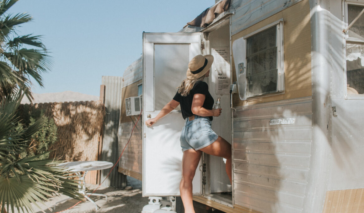 A woman walking into her RV after replacing her RV lock on her door