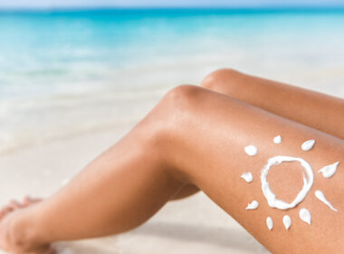 A person at the beach wearing reef safe sunscreen