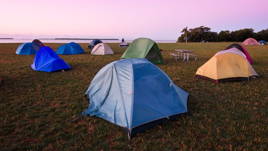 Camping tents set up at a campground using CampersCard