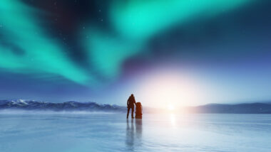 A person looking at the northern lights
