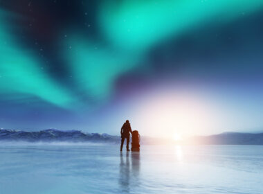 A person looking at the northern lights