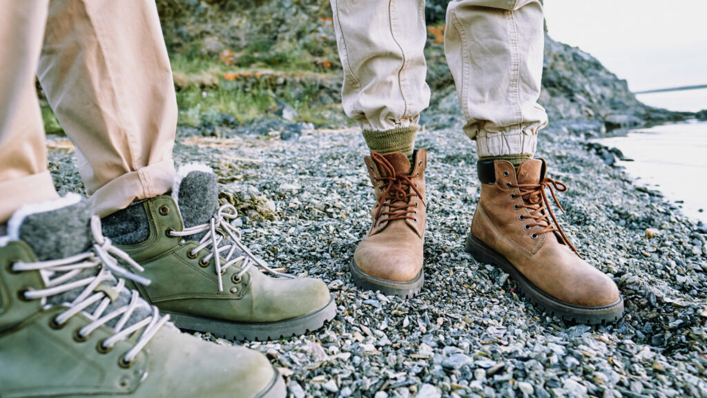 Close up of two hikers wearing hiking boots