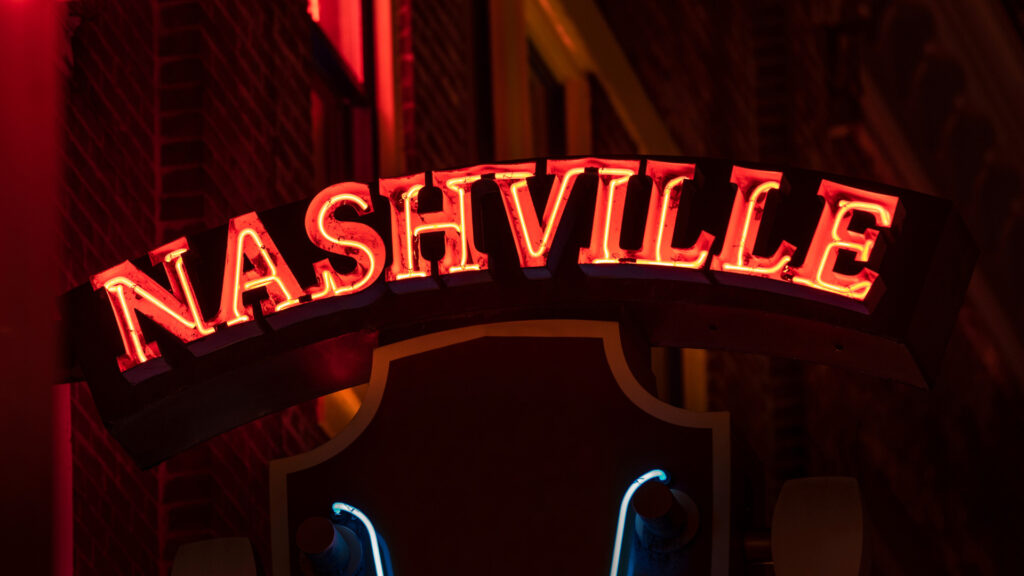 A Nashville sign outside of a bar