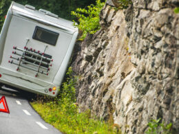 A broken down RV on the side of the road