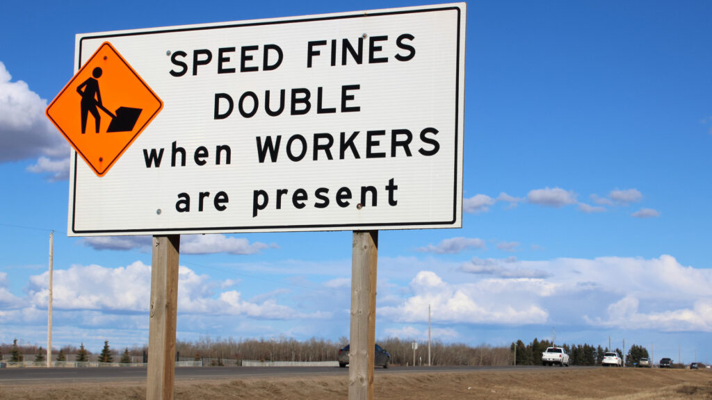 A sign for speeding in a construction zone