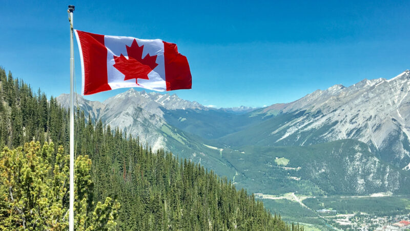 View of a Canadian Flag in the mountains