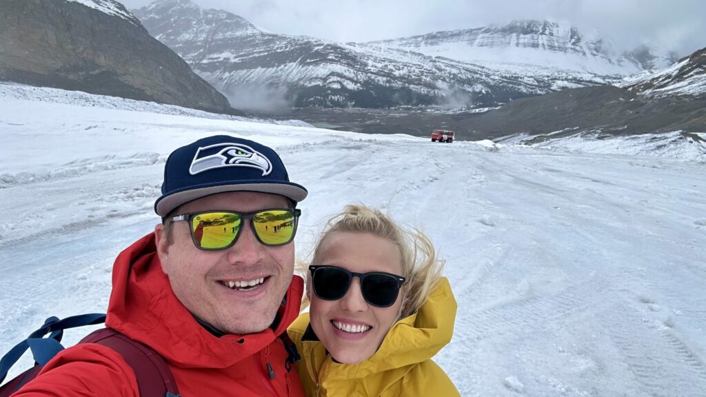 A couple smiling at the Columbia Icefield