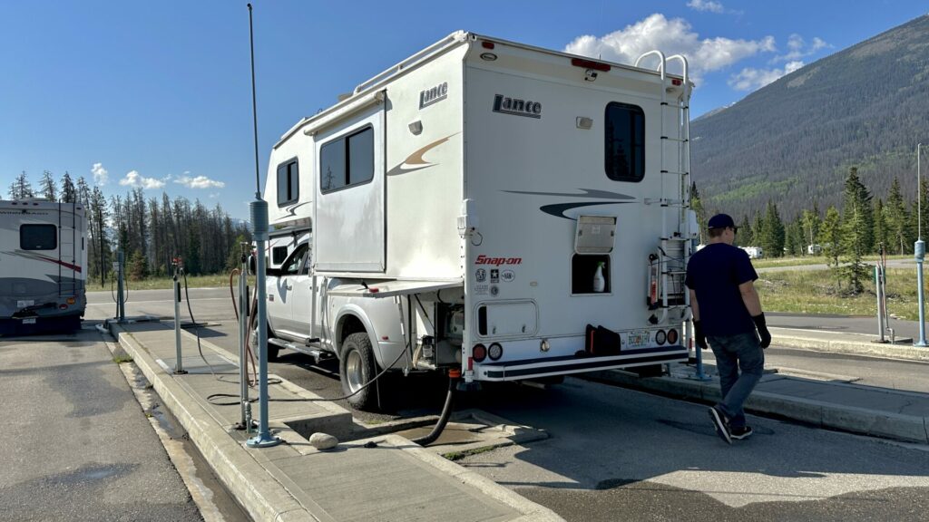 The dump station with RVs using it at Whistlers Campground