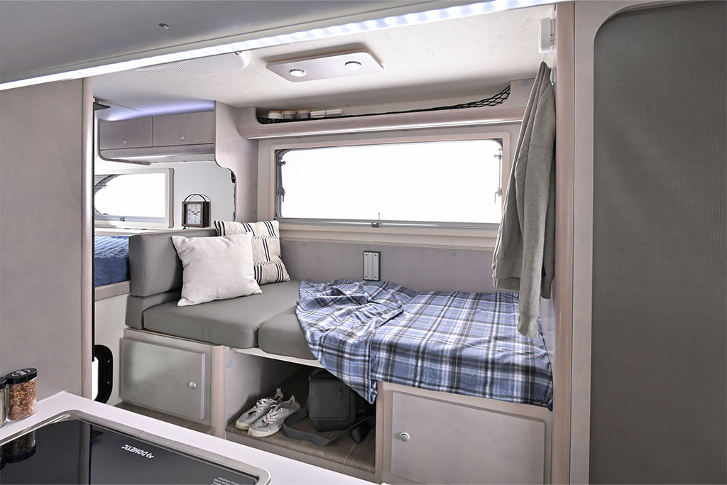 A bed inside a cirrus truck camper