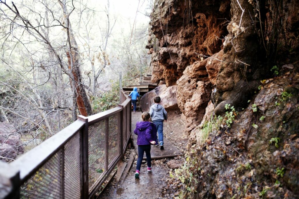 Kids hiking to waterfall in Colorado