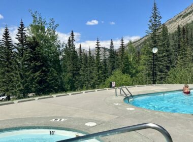 Couple sitting in a pool at Miette Hot Springs