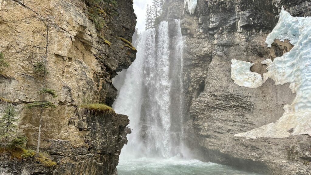 A waterfall at Johnston Canyon hike in Banff National Park