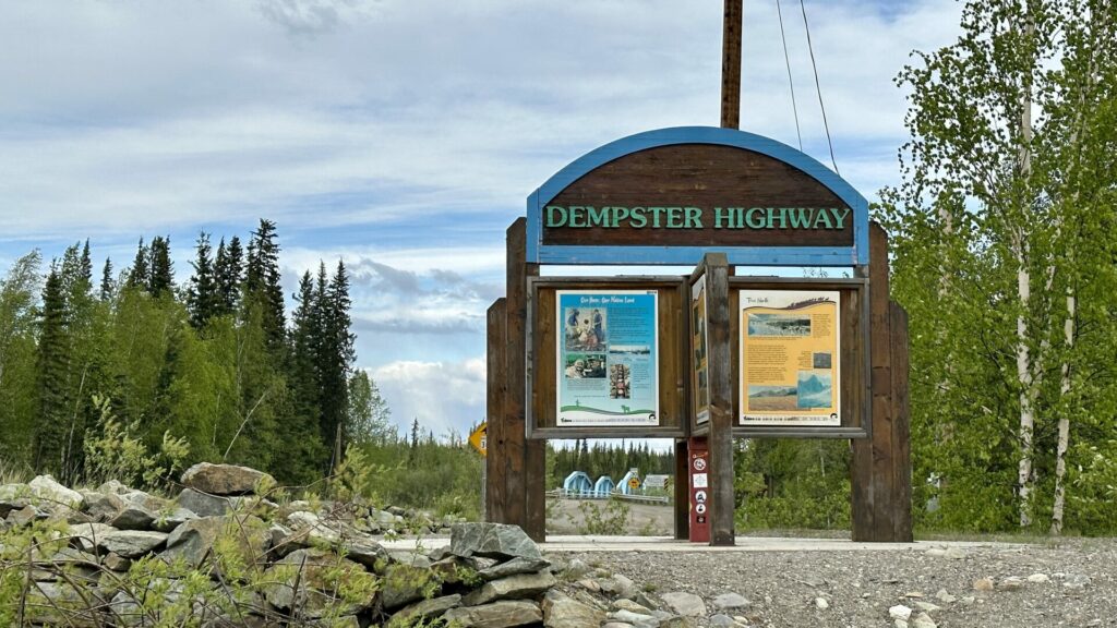 A sign for Demspter Highway