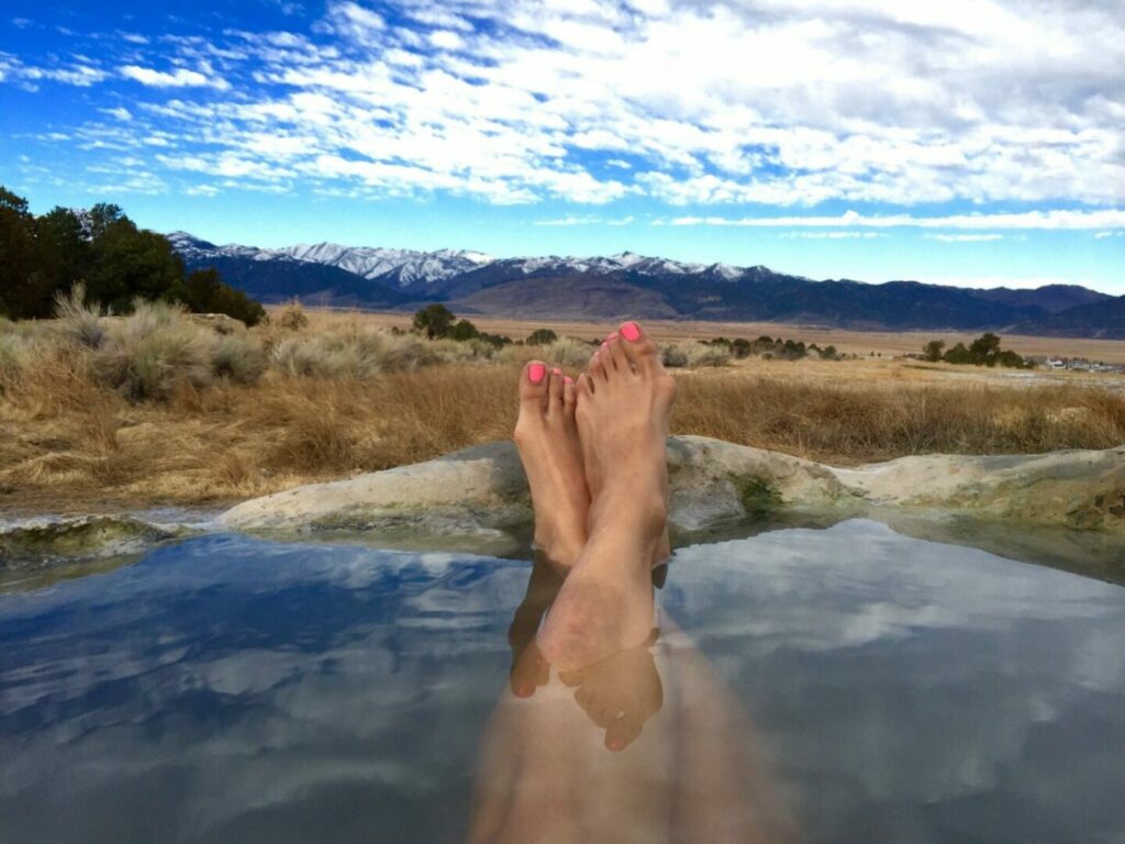 Woman's feet propped up while relaxing in Wyoming Hot Springs
