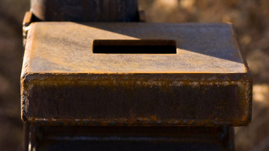 Close up of an iron ranger box at a campground.