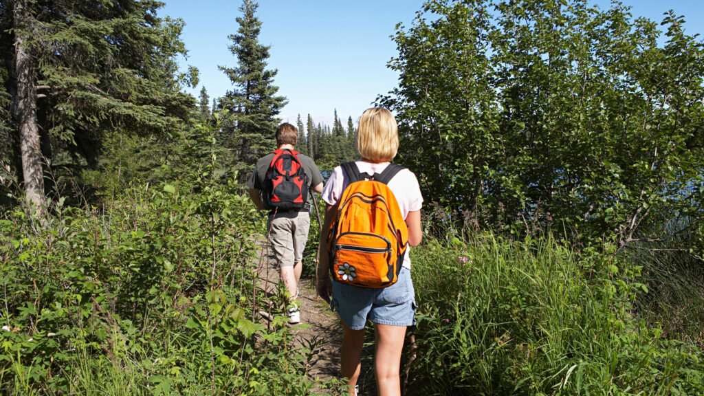 A couple hiking in Hope, Alaska near porcupine campground.