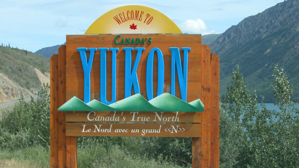 A welcome to Yukon sign.