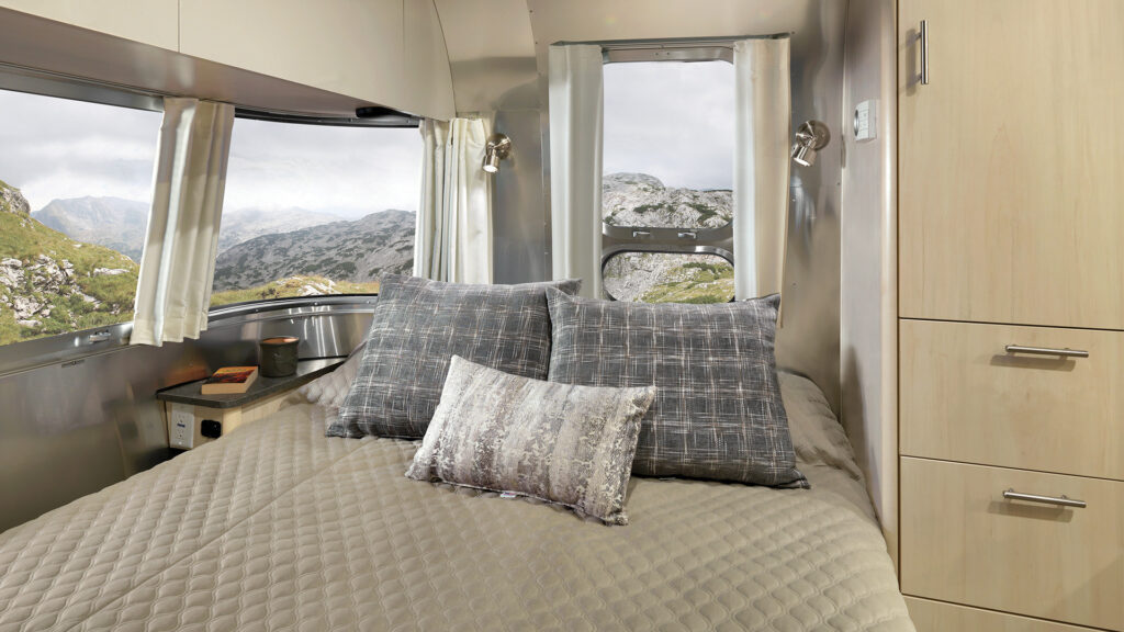 A bedroom  inside an Airstream Flying Cloud.