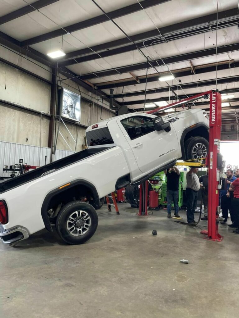 An RVers truck that slipped off the lift at the mechanics during an oil change.