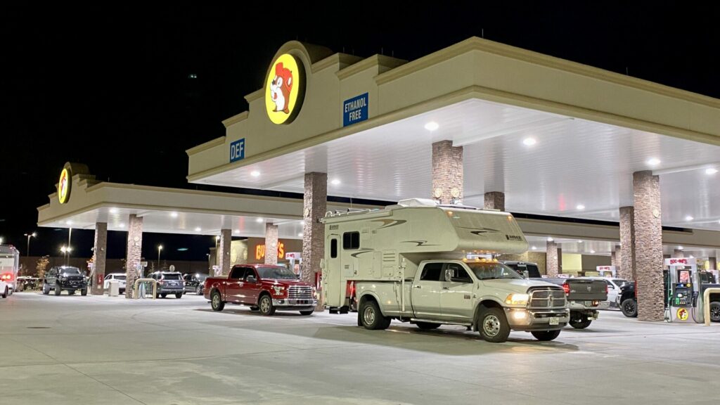 vehicles filling up with gas at a buc-ees gas station.