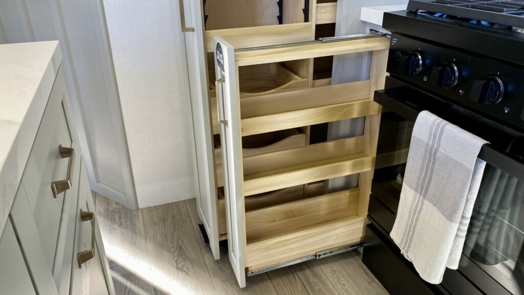 Cupboards that pull out with shelves. Innovative storage solutions is a topic you should consider when comparing used vs new RVs. 