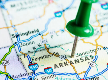 A push pin on Arkansas on a map.