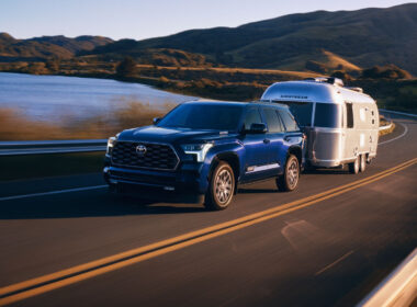 A toyota sequoia towing an RV to a campground