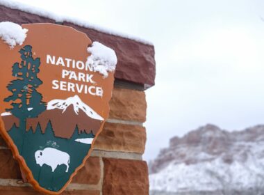 Close up of a national park sign in winter.