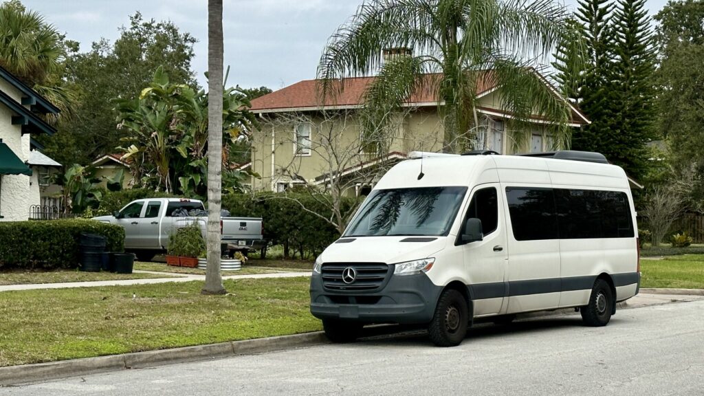 A class B van parked in a residential street.