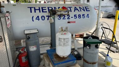 Filling a 30 lb propane tank at a local propane supplier