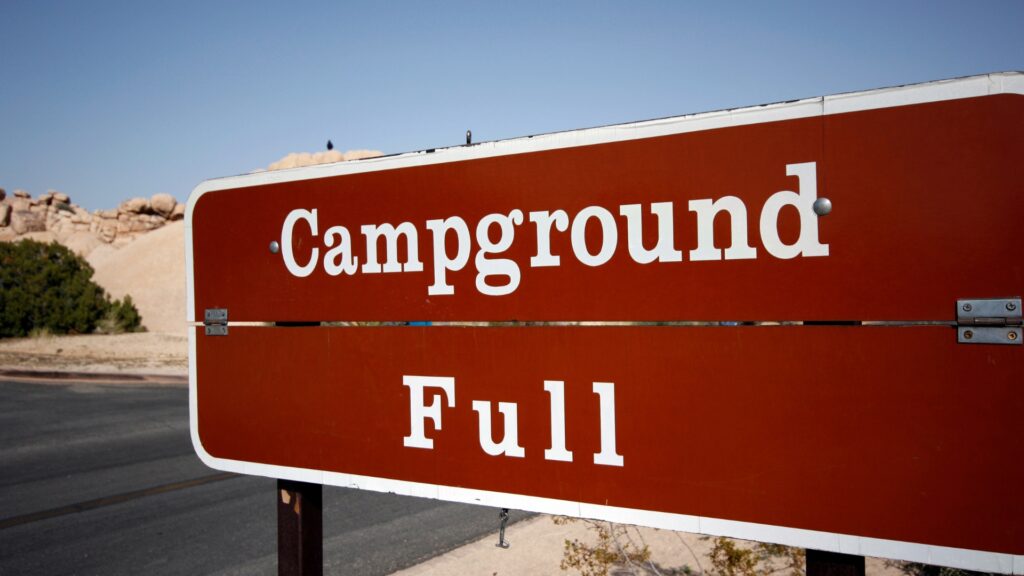 A sign that says "campground full".