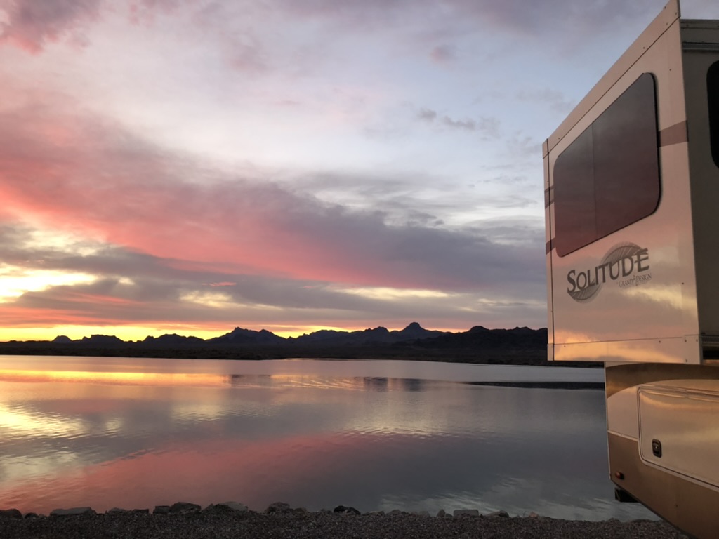 A peaceful sunset from an rv park overlooking the water in Lake Havasua, Arizona