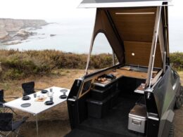 Space Camper for the Tesla Cyber Truck open and setup with a kitchenette