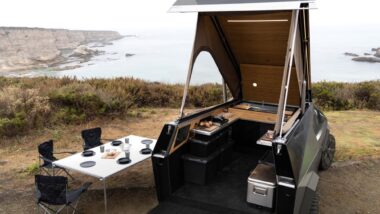 Space Camper for the Tesla Cyber Truck open and setup with a kitchenette