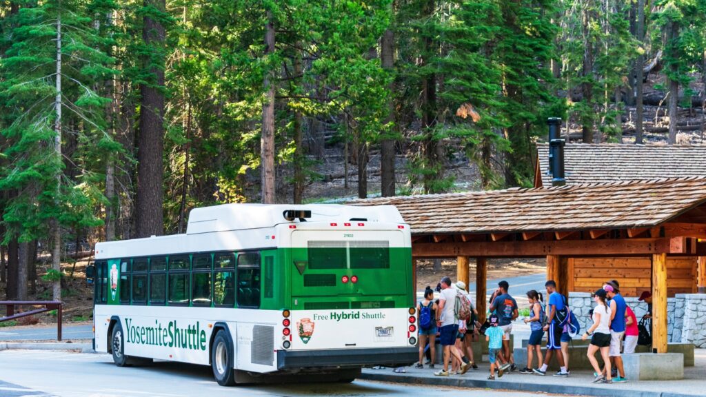 People loading up at one of the Yosemite Shuttle bus stop. 