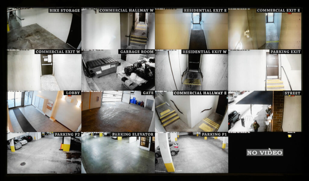 Small high end camera system of a building. Parking, gate, garbage and recycling room, staircase and hallway.