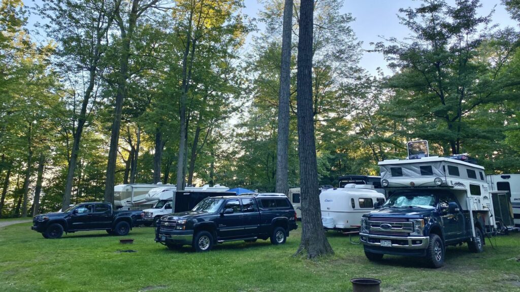 Different types of RVs in a campground.