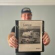 jason of getaway couple holding an old rv manual