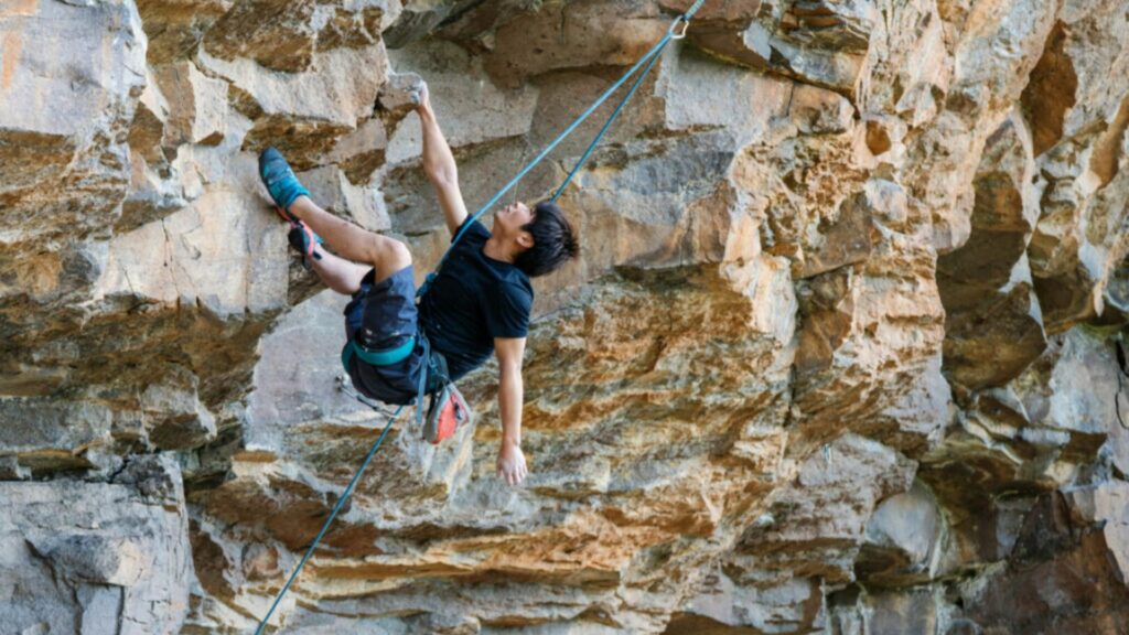 A man rock climbing at New River Gorge National Park