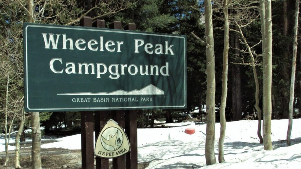 Wheeler Peak Campground Sign in the Snow at Great Basin National Park.