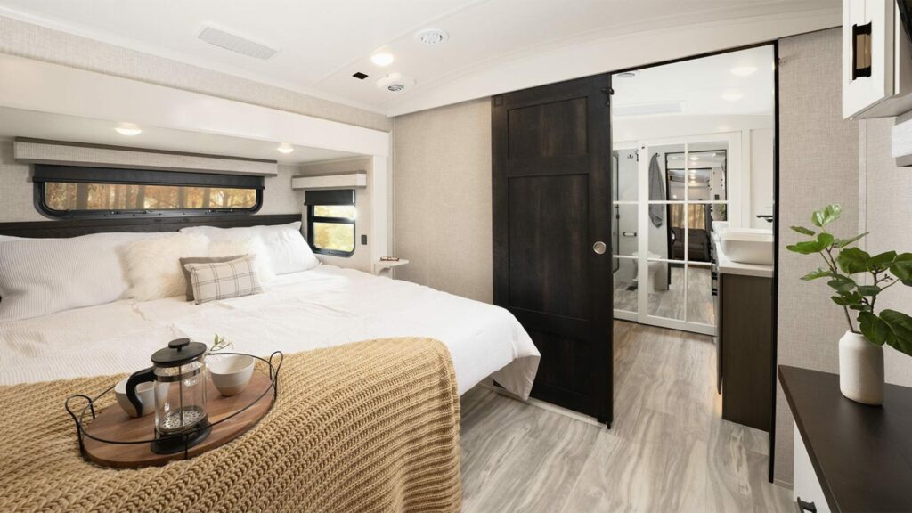 The bedroom of the Jayco Pinnacle RV. 