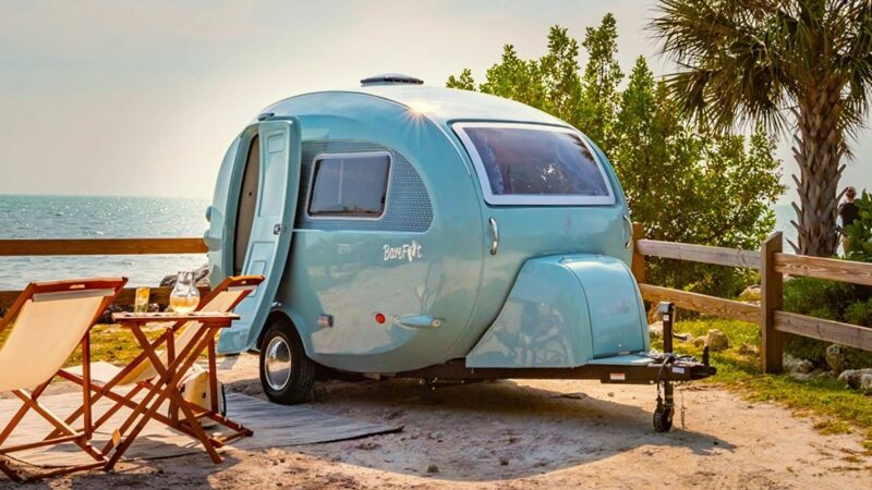 Blue Barefoot retro trailer on the beach.